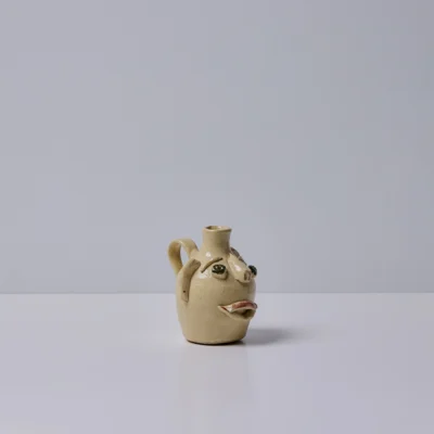 Green-Eyed Face Jug by Fred Beane