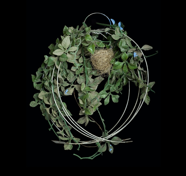 Seed Eater Nest in Plastic Foliage by Sharon Beals